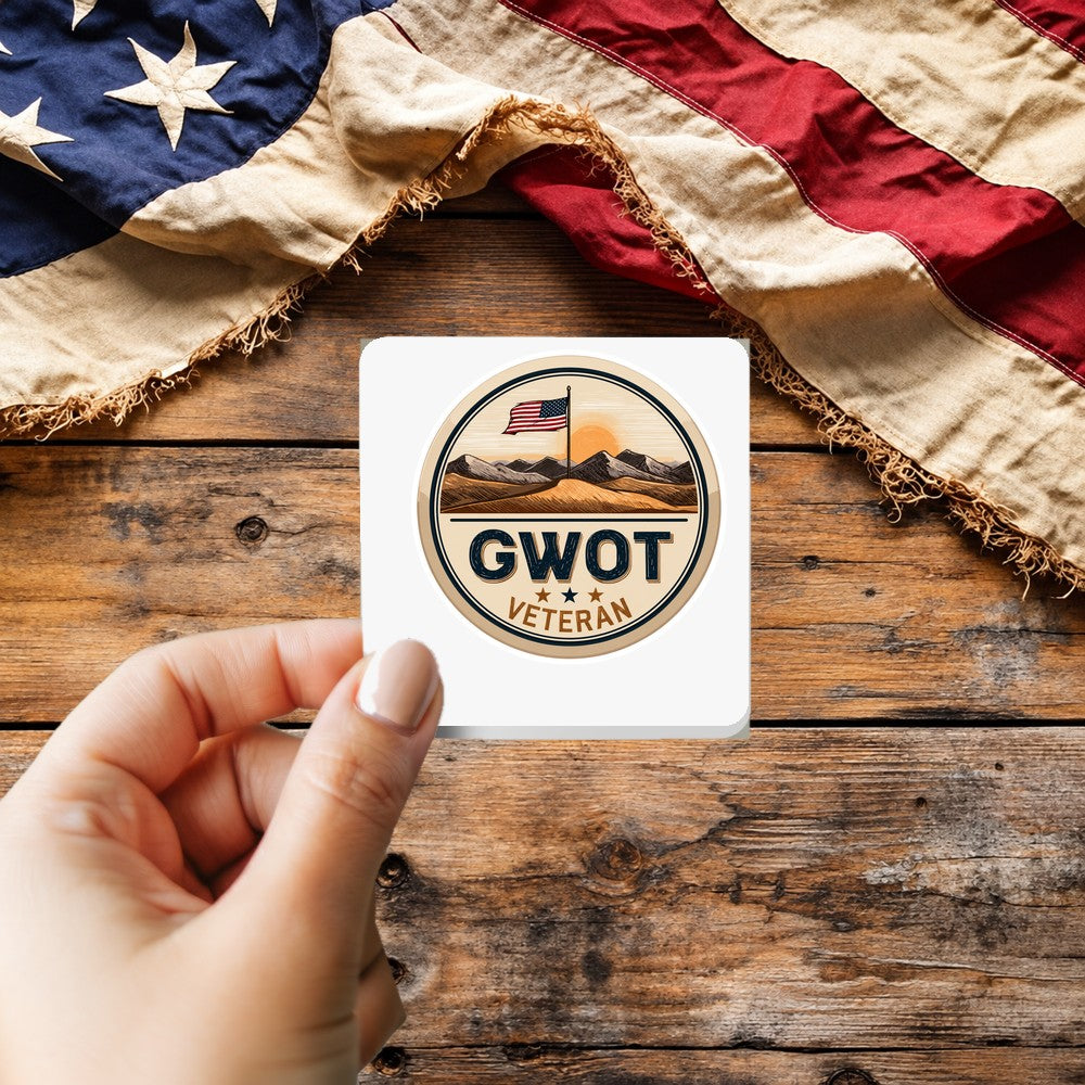 GWOT Veteran sticker held over a vintage American flag on rustic wood, Veterans Day gift