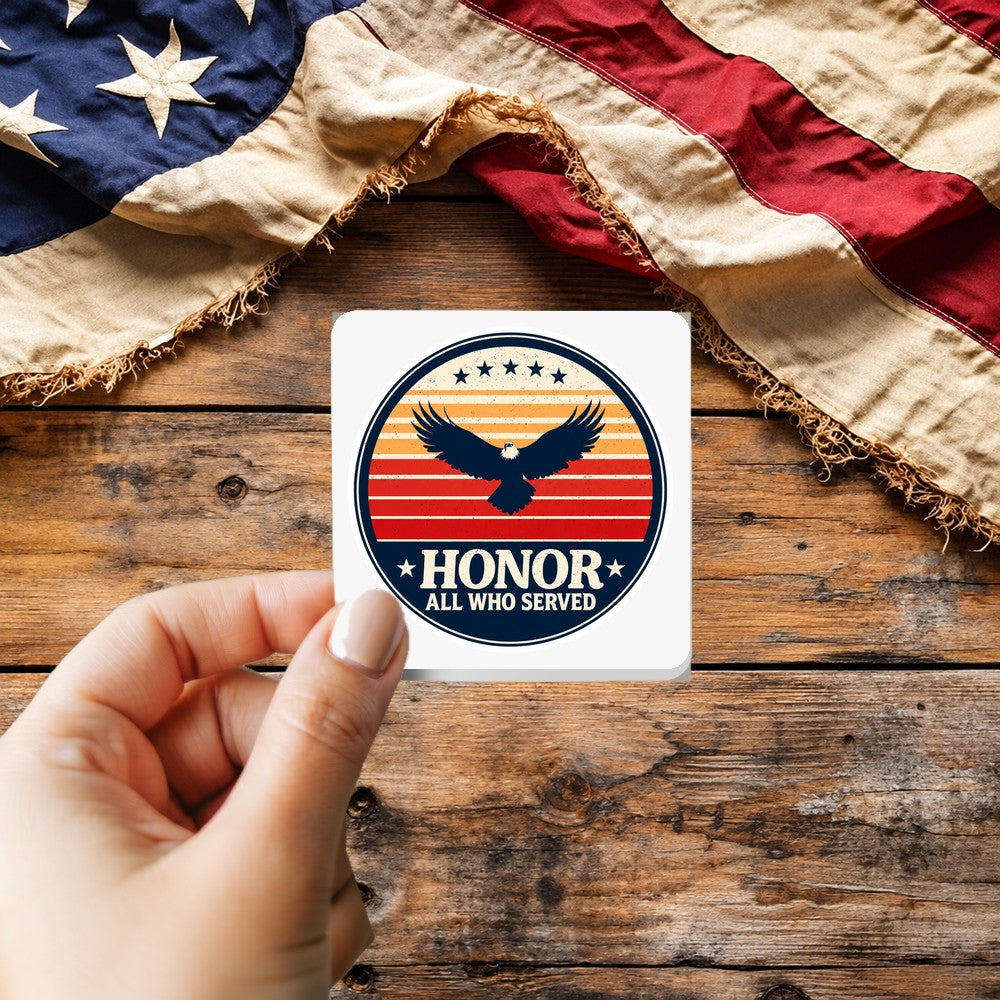 Honor All Who Served Patch Style sticker held over a vintage American flag on rustic wood, Veterans Day gift
