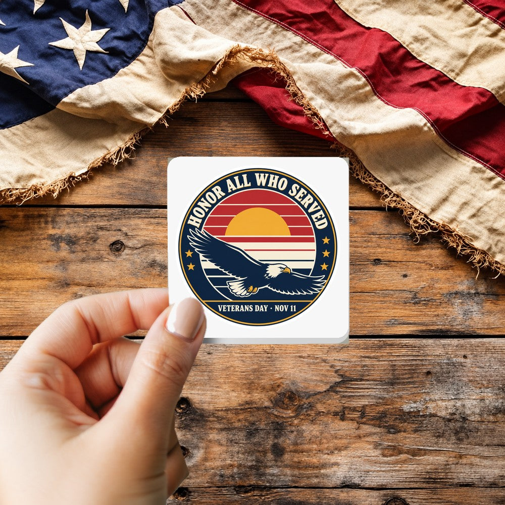 Honor All Who Served sticker held over a vintage American flag on rustic wood, Veterans Day gift
