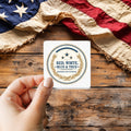 Honoring Our Veterans Vintage Seal sticker held over a vintage American flag on rustic wood, Veterans Day gift