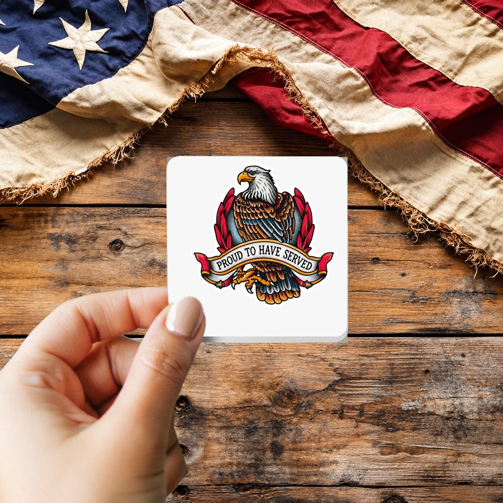 Proud to Have Served Tattoo Style sticker held over a vintage American flag on rustic wood, Veterans Day gift
