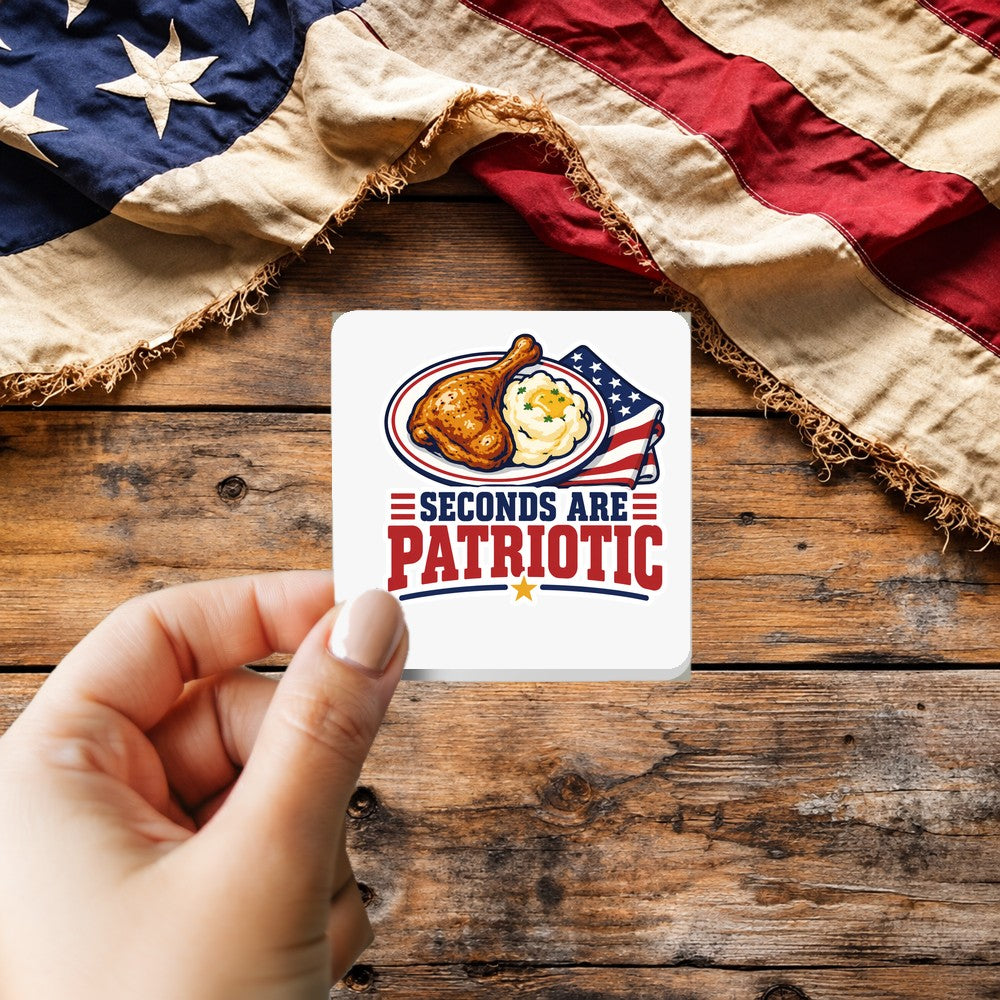 Seconds Are Patriotic sticker held over a vintage American flag on rustic wood, patriotic Thanksgiving gift