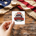Thank a Veteran Today sticker held over a vintage American flag on rustic wood, Veterans Day gift